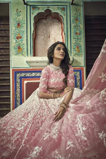 PEACH PEARL AND THREAD EMBROIDERED SOFT NET FESTIVE & PARTY WEAR SEMI STITCHED BRIDAL LEHENGA