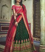 GREEN & RED SEQUINS,PEARL AND THREAD EMBROIDERED SOFT NET FESTIVE & PARTY WEAR SEMI STITCHED BRIDAL LEHENGA