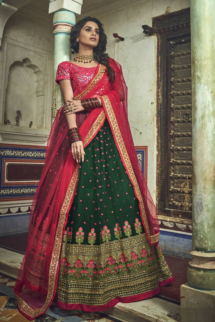 GREEN & RED SEQUINS,PEARL AND THREAD EMBROIDERED SOFT NET FESTIVE & PARTY WEAR SEMI STITCHED BRIDAL LEHENGA