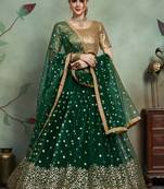 DARK GREEN SEQUINS EMBROIDERED SOFT NET FESTIVE & PARTY WEAR SEMI STITCHED LEHENGA