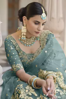 TURQUOISE SEQUINS AND DORI EMBROIDERED SOFT NET FESTIVE & PARTY WEAR SEMI STITCHED LEHENGA