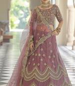 MAUVE SEQUINS AND DORI EMBROIDERED SOFT NET FESTIVE & PARTY WEAR SEMI STITCHED LEHENGA