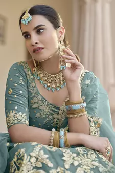 TURQUOISE SEQUINS AND DORI EMBROIDERED SOFT NET FESTIVE & PARTY WEAR SEMI STITCHED LEHENGA