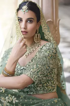 LIGHT GREEN SEQUINS AND DORI EMBROIDERED SOFT NET FESTIVE & PARTY WEAR SEMI STITCHED LEHENGA
