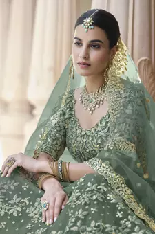 LIGHT GREEN SEQUINS AND DORI EMBROIDERED SOFT NET FESTIVE & PARTY WEAR SEMI STITCHED LEHENGA