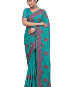 Turquoise embroidered georgette saree with blouse