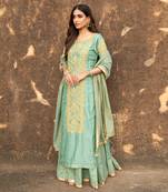 Gota Embroidered Long Kurta Paired With A Banarasi Skirt And Tissue Dupatta