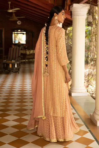 Gota Pearl Embroidered Heavy Kurta Paired With A Banarasi Skirt And Net Dupatta