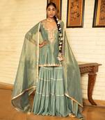 Hand Embroidered Short Kurta In Tissue Paired With A Tier Sharara And A Tissue Dupatta