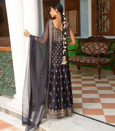 Zari Embroidered Short Kurta Paired With A Gharara And An Organza Dupatta