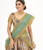 Beige  Banarasi silk Zari Half saree with Sea Green color dupatta with Unsttiched blouse