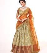 Yellow  Banarasi silk Zari lehenga with  Orange color dupatta with Unstiched blouse