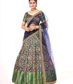 Green color  Banarasi silk Zari lehenga with  Navy Blue color dupatta with Unsttiched blouse