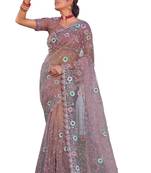 Peach embroidered net saree with blouse