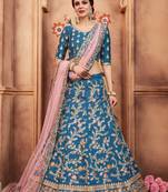 TURQUOISE THREAD AND SEQUINS EMBROIDERED ART SILK FESTIVE BRIDAL WEDDING & PARTY WEAR SEMI STITCHED LEHENGA CHOLI