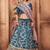 TURQUOISE THREAD AND SEQUINS EMBROIDERED ART SILK FESTIVE BRIDAL WEDDING & PARTY WEAR SEMI STITCHED LEHENGA CHOLI