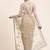 Beige embroidered net saree with blouse