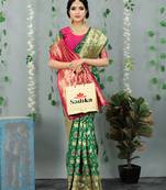 Green woven banarasi silk saree with blouse