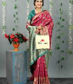 Rani pink woven banarasi silk saree with blouse