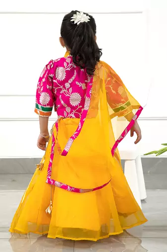 Beautiful Floral Brocade Embroidered Front Open Multicolour Top And Yellow Flared Organza Lehenga With Matching Dupatta
