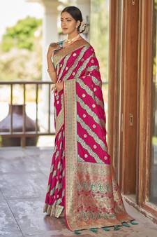 Pink woven banarasi saree with blouse