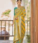 Yellow woven banarasi saree with blouse