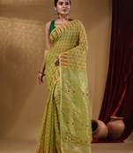 Pistachio Green Cotton Handwoven Jamdani Saree With Woven Buttas And Floral Designs