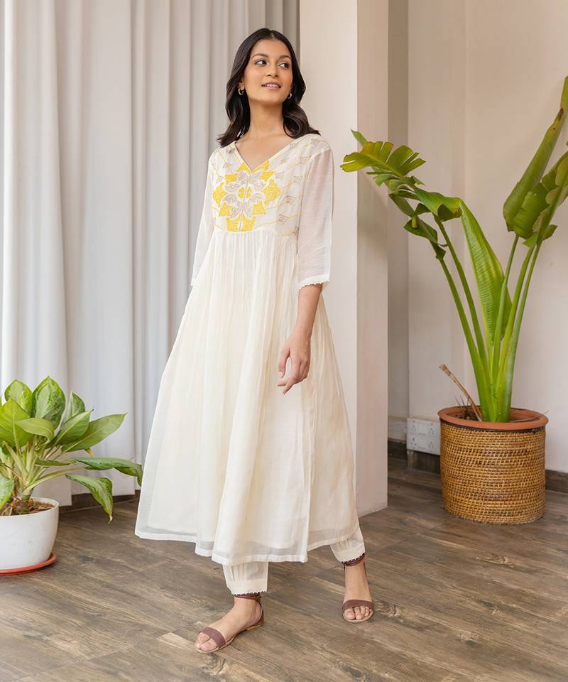Yellow Full Yoke Embroided Kurta With Pleated Pants