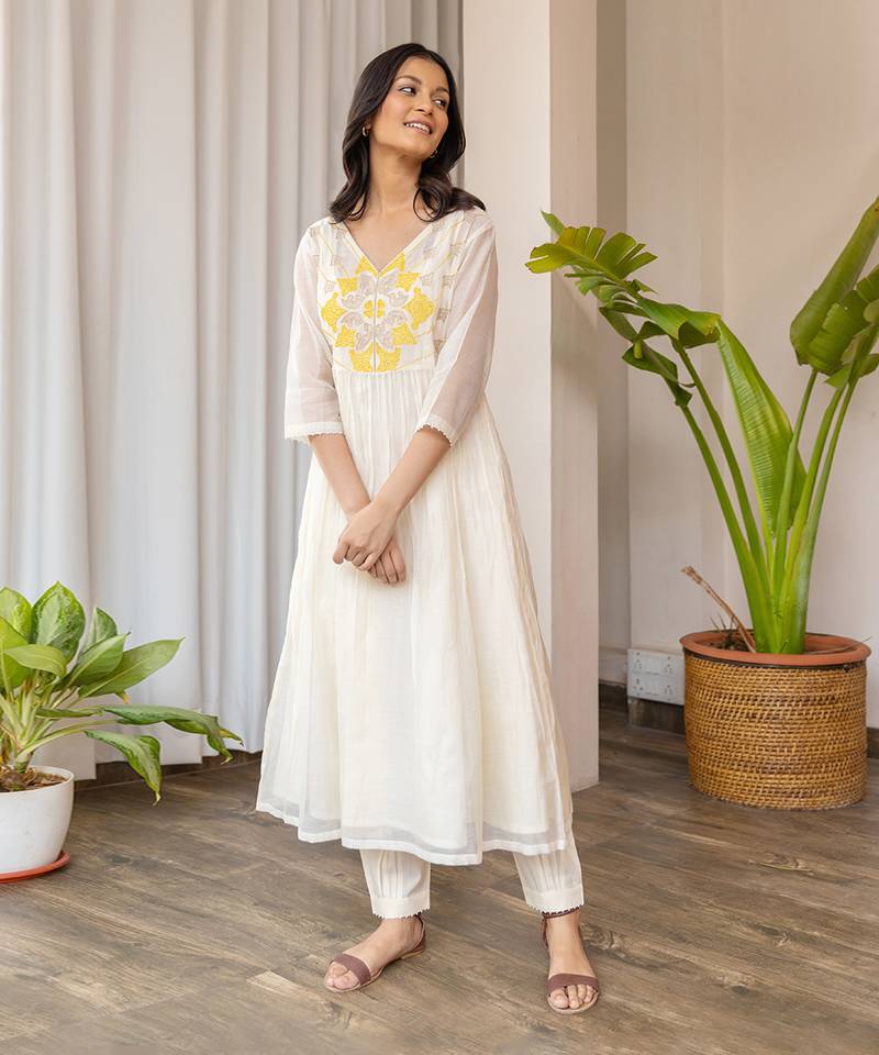 Yellow Full Yoke Embroided Kurta With Pleated Pants