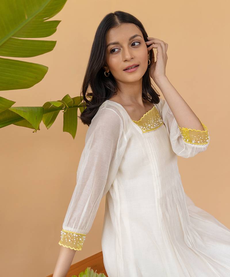 Yellow Organza With Pearl Detailing And Pleats In The Center Dress