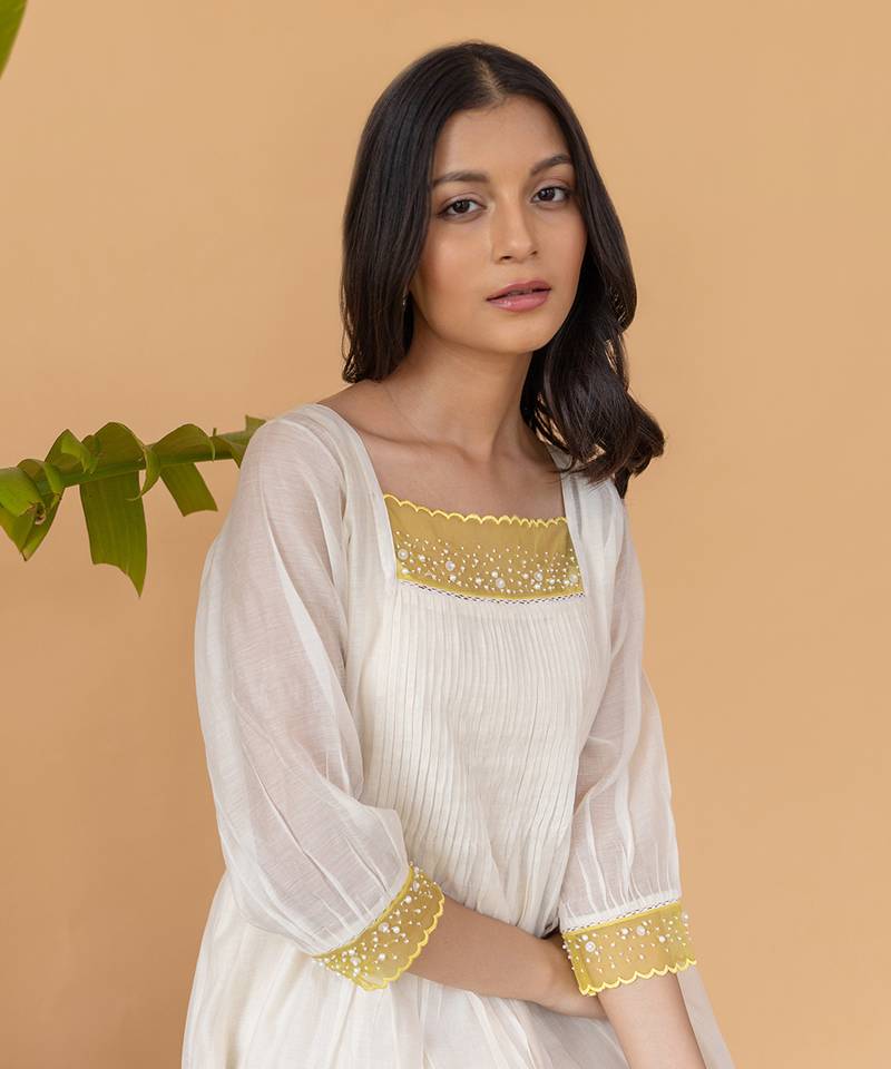 Yellow Organza With Pearl Detailing And Pleats In The Center Dress