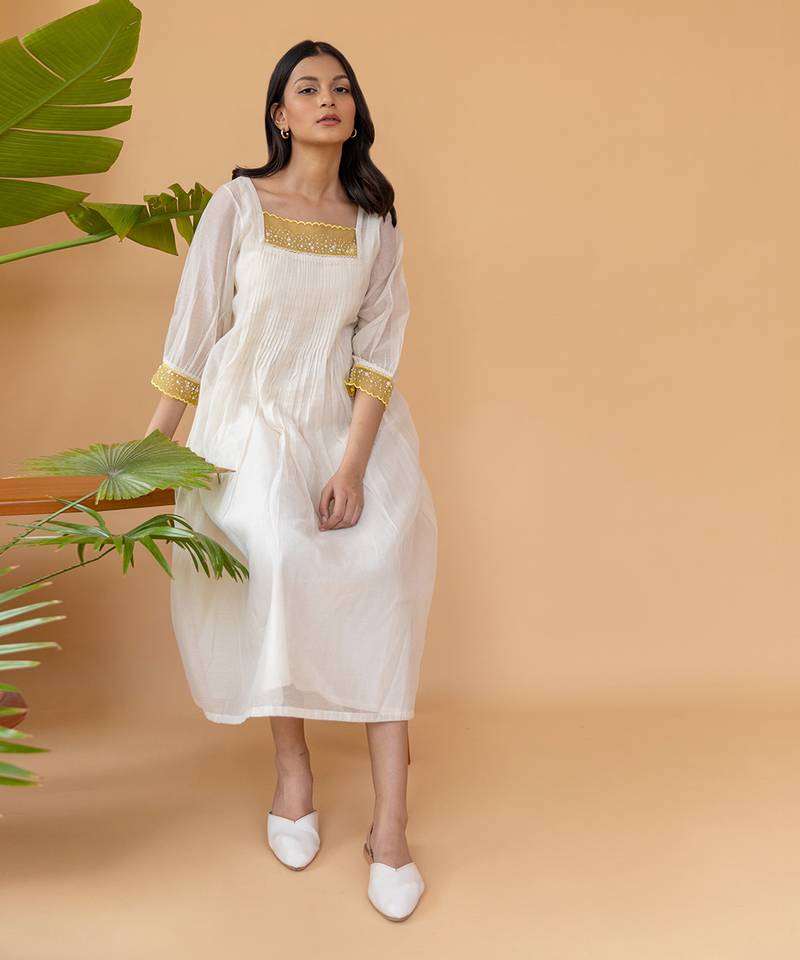 Yellow Organza With Pearl Detailing And Pleats In The Center Dress