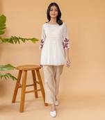 Red Embroidery On Sleeves With Smocking In The Center Top And Straight Cotton Pants In Beige