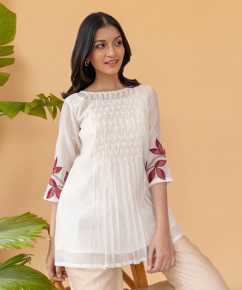 Red Embroidery On Sleeves With Smocking In The Center Top And Straight Cotton Pants In Beige