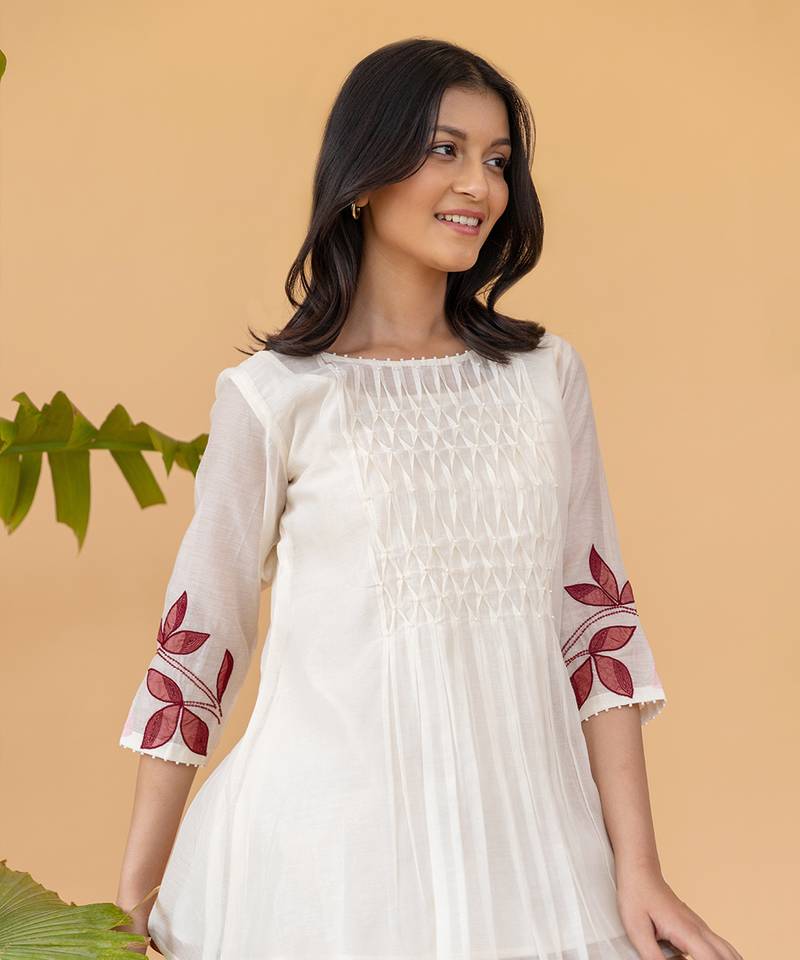 Red Embroidery On Sleeves With Smocking In The Center Top And Straight Cotton Pants In Beige