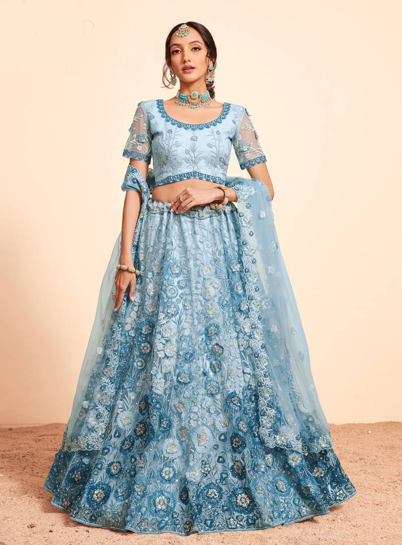 Bewitching Firozi sequins, thread, and zari Embroidered and hand embellished done all over the designer wedding lehenga