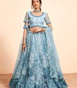 Bewitching Firozi sequins, thread, and zari Embroidered and hand embellished done all over the designer wedding lehenga