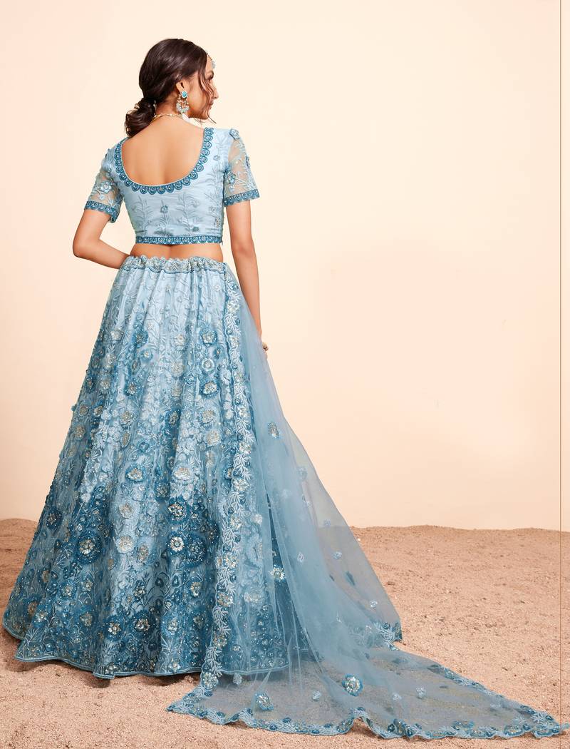 Bewitching Firozi sequins, thread, and zari Embroidered and hand embellished done all over the designer wedding lehenga