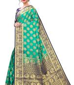 Green woven banarasi silk saree with blouse