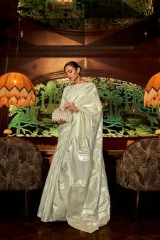 Green woven banarasi saree with blouse