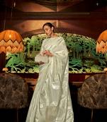 Green woven banarasi saree with blouse