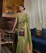 Dark Green Woven Organza Saree With Blouse