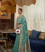 Turquoise Woven Organza Saree With Blouse