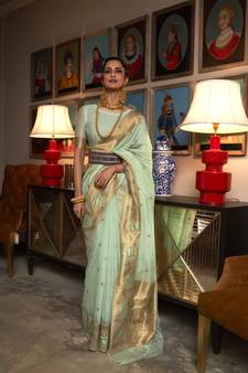 Light green woven silk saree with blouse