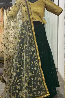 Mesmerizing Green golden zari, sequins and thread embroidered georgette Lehenga choli