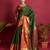 Dark green woven silk saree with blouse