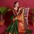 Dark green woven silk saree with blouse