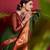Dark green woven silk saree with blouse