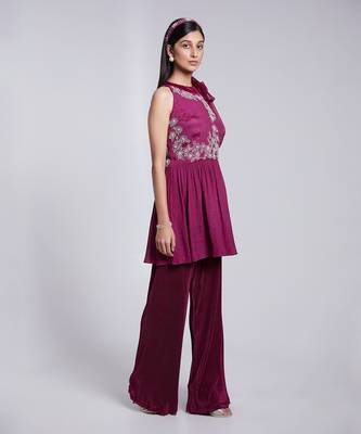 Beautiful Peplum Top With Tie Up At The Neckline Paired With Crush Fabric Pants. 2