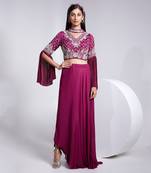 A Fllawless V Neckline Crop Top Emrbiodered Uniquely. The Sleeve Has Cut Flare Details. The Skirt Is Pre Draped.